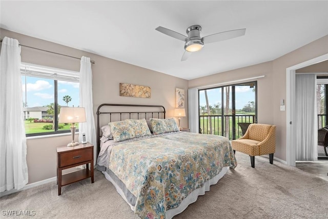 carpeted bedroom with ceiling fan and access to exterior