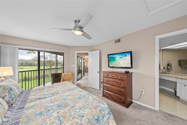 carpeted bedroom with connected bathroom, access to outside, and ceiling fan