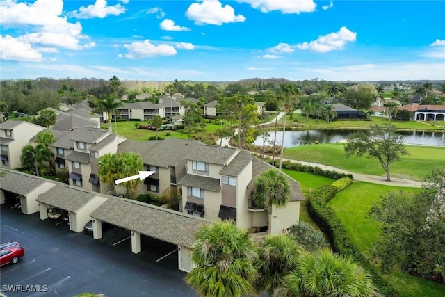 drone / aerial view with a water view