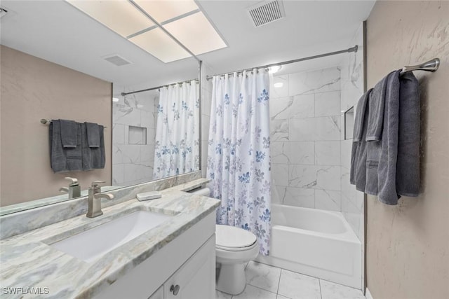 full bathroom featuring vanity, shower / bath combination with curtain, and toilet