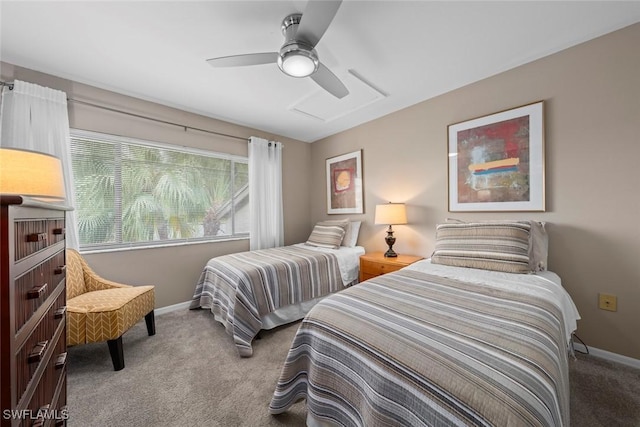 bedroom featuring ceiling fan and carpet floors