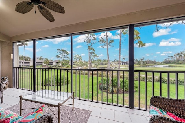 sunroom / solarium with ceiling fan