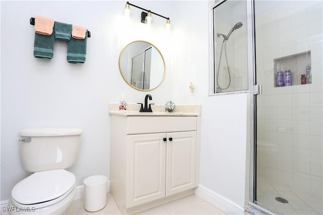 bathroom featuring toilet, vanity, and walk in shower