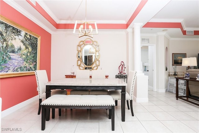 dining space featuring light tile patterned floors, decorative columns, a notable chandelier, ornamental molding, and a raised ceiling