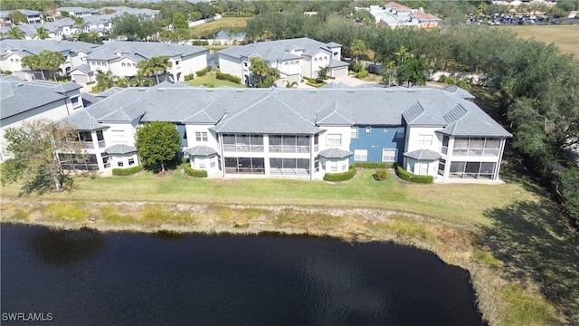 aerial view featuring a water view