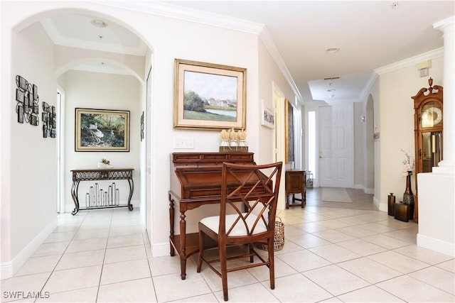 corridor with light tile patterned floors and crown molding