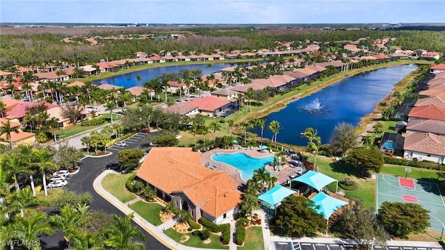 bird's eye view featuring a residential view and a water view