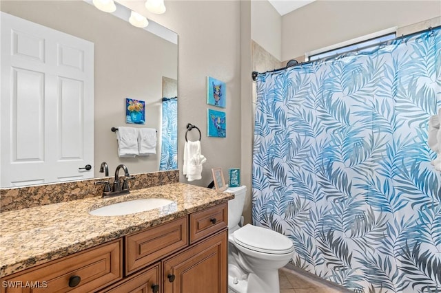 full bathroom with tile patterned flooring, a shower with shower curtain, vanity, and toilet