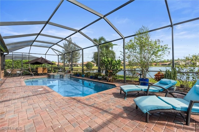 view of swimming pool featuring a patio, glass enclosure, a water view, and a pool with connected hot tub