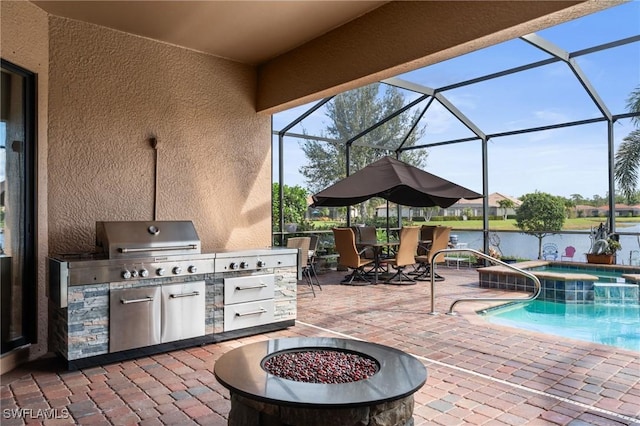 view of patio featuring a lanai, a pool with connected hot tub, and area for grilling