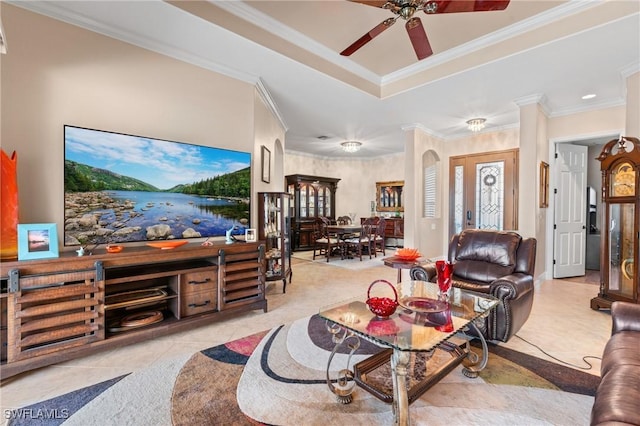 11035 Longwing Dr, Fort Myers, FL 33912 - living area with tile patterned floors, ornamental molding, ceiling fan, and a tray ceiling