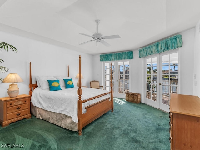 carpeted bedroom featuring french doors, ceiling fan, and access to outside