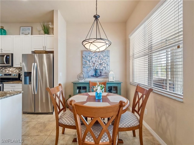 view of tiled dining room