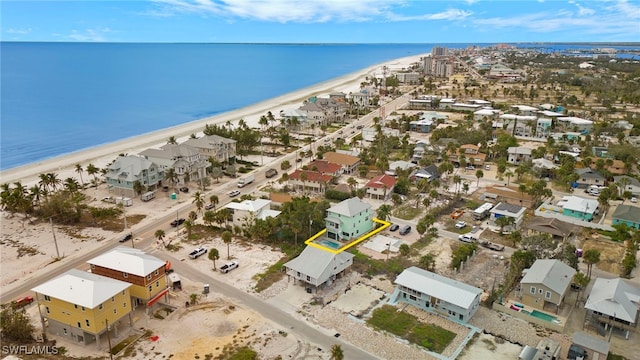 bird's eye view with a view of the beach and a water view