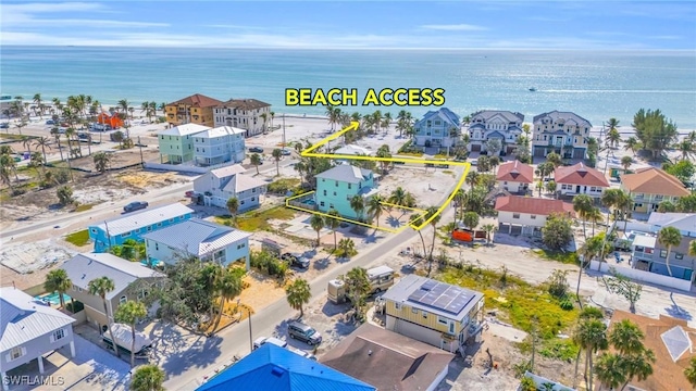 bird's eye view with a residential view and a water view