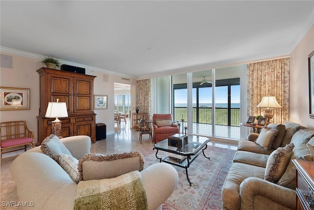 living area with ornamental molding, baseboards, expansive windows, and ceiling fan