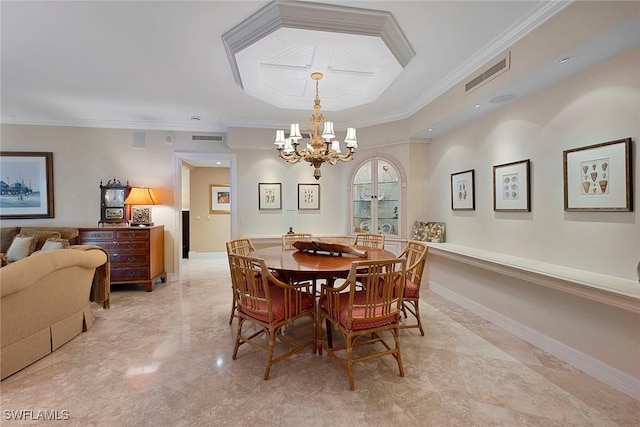 dining area with crown molding, baseboards, visible vents, and a notable chandelier