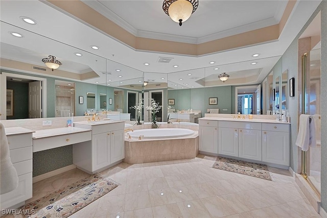 bathroom with a raised ceiling, a stall shower, and crown molding