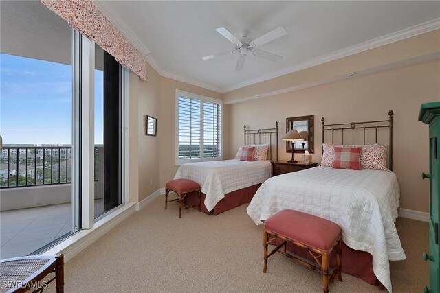 carpeted bedroom with baseboards, ornamental molding, and a ceiling fan