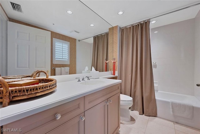 full bathroom with tile patterned flooring, vanity, toilet, visible vents, and shower / bath combo