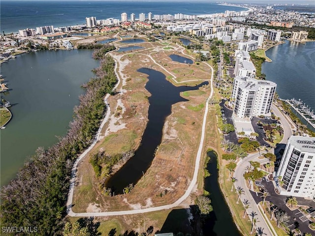 birds eye view of property featuring a water view