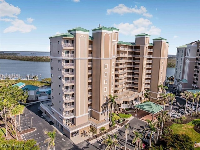 view of building exterior featuring a water view