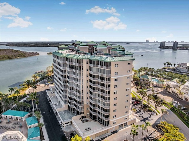 birds eye view of property featuring a water view