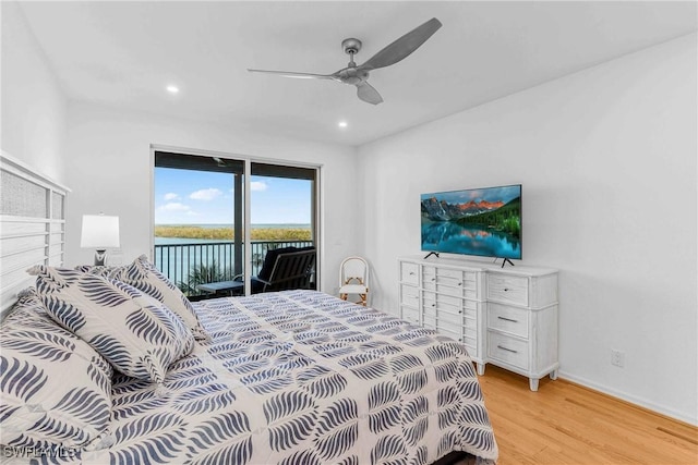 bedroom with ceiling fan, access to exterior, and light hardwood / wood-style floors