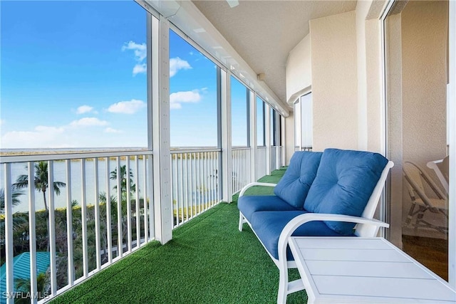 sunroom with a water view