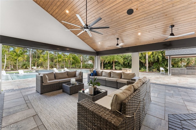 view of patio featuring an outdoor hangout area and ceiling fan