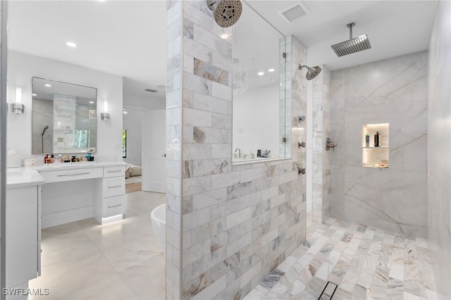 bathroom featuring vanity and separate shower and tub