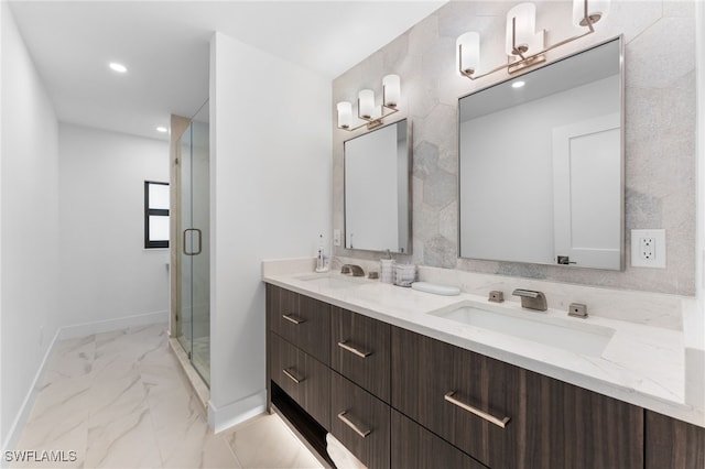 bathroom with vanity and an enclosed shower