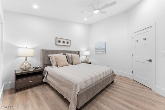 bedroom featuring ceiling fan and light wood-type flooring