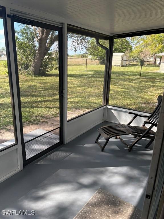 unfurnished sunroom with a healthy amount of sunlight