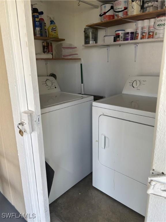 washroom featuring independent washer and dryer