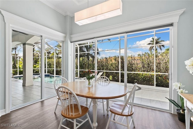 3747 Fountainhead Ln, Naples, FL 34103 - sunroom with wood finished floors, healthy amount of natural light, and ornamental molding