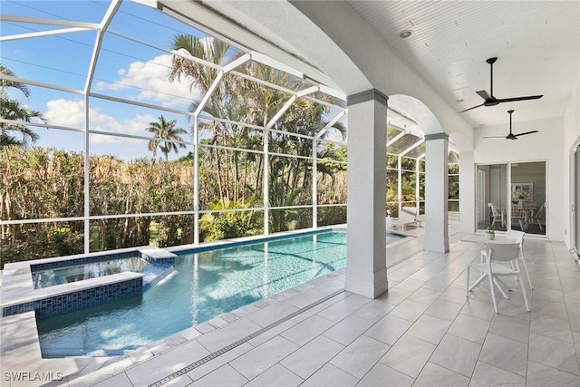 3747 Fountainhead Ln, Naples, FL 34103 - view of swimming pool featuring a pool with connected hot tub, a patio area, glass enclosure, and a ceiling fan