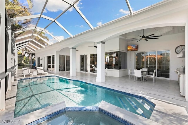 3747 Fountainhead Ln, Naples, FL 34103 - view of swimming pool featuring a ceiling fan, a patio area, and a pool with connected hot tub