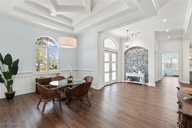 3747 Fountainhead Ln, Naples, FL 34103 - dining space with french doors, dark wood-style floors, ornamental molding, wainscoting, and a chandelier