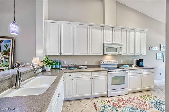 kitchen with white cabinetry, sink, white appliances, and decorative light fixtures