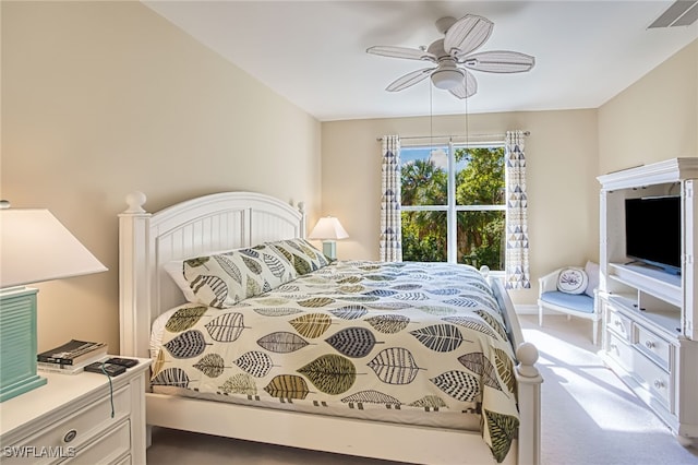 bedroom featuring ceiling fan and carpet floors