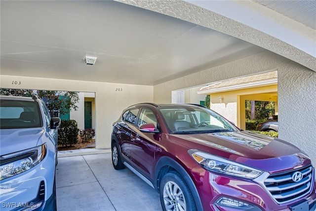 garage with a carport