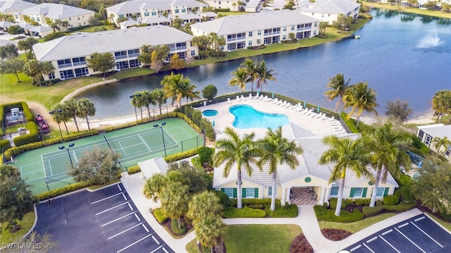 birds eye view of property featuring a water view