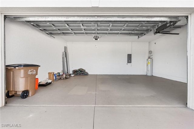 garage featuring water heater and electric panel