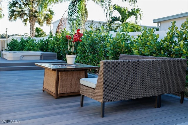 deck with an outdoor fire pit