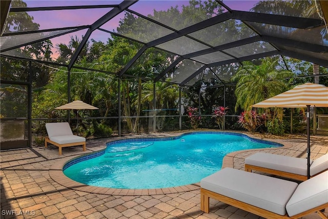 outdoor pool featuring a patio