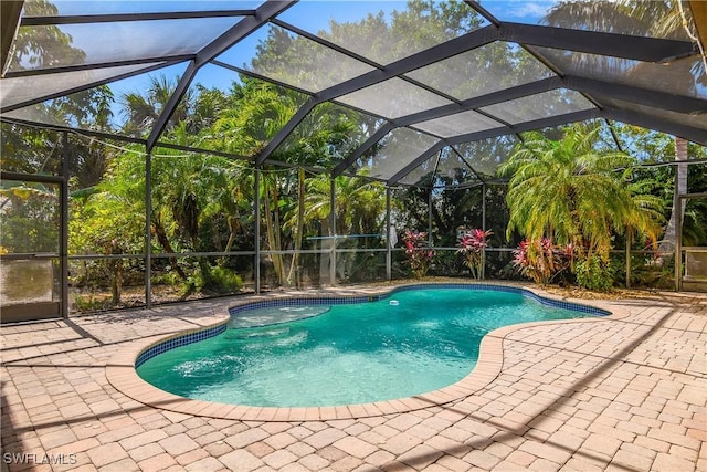 pool featuring a patio area