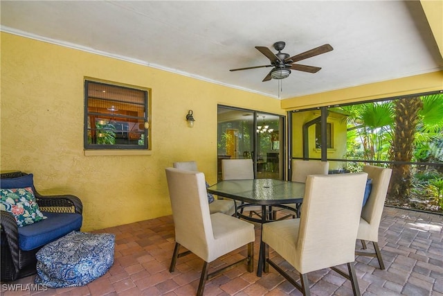 view of patio / terrace featuring a ceiling fan and outdoor dining area