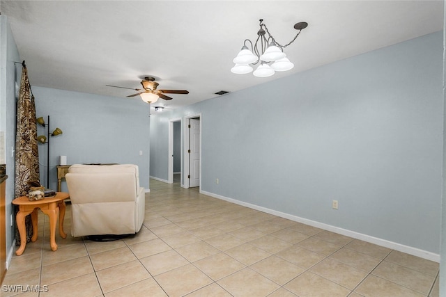 23250 El Dorado Blvd, Bonita Springs, FL 34134 - living area with light tile patterned floors, a ceiling fan, a chandelier, and baseboards