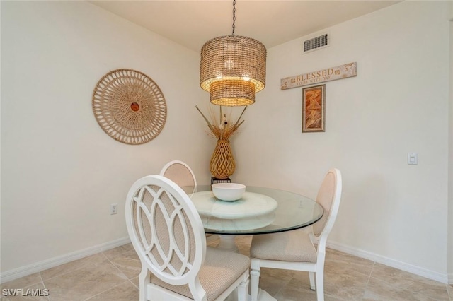 dining room featuring light tile patterned flooring